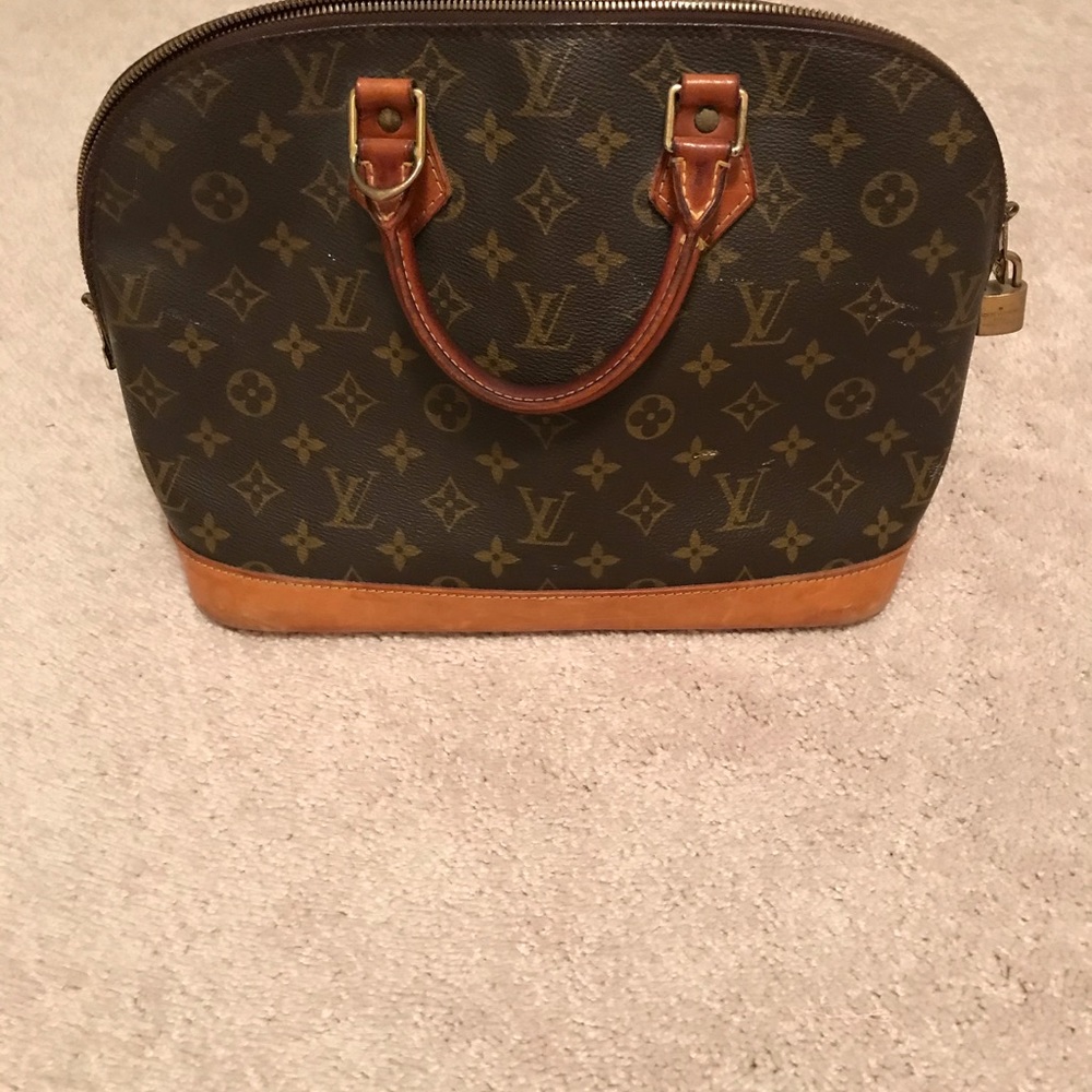 Authentic Louis Vuitton Alma Hand Bag